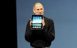 Steve Jobs with Apple iPad