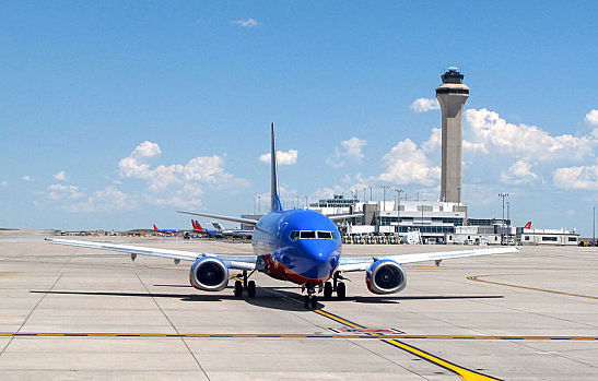 Plane on runway at Denver International Airport