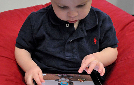 Child with iPad